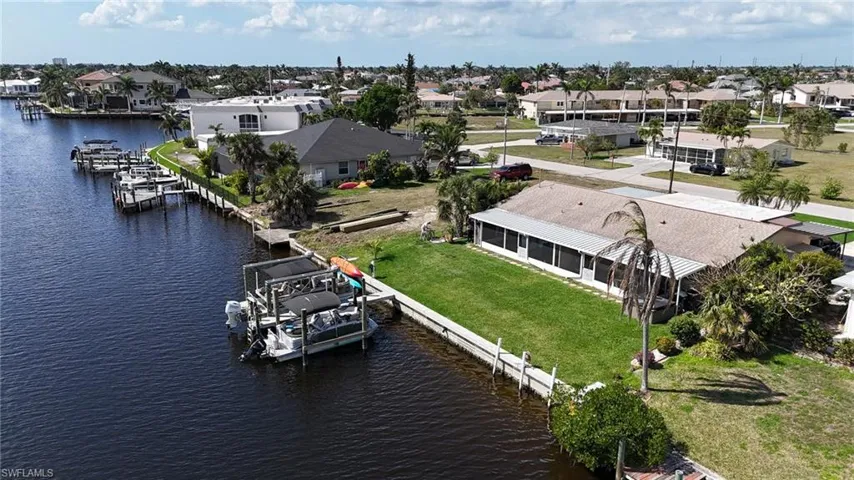 Bird's eye view featuring a water view and a residential view