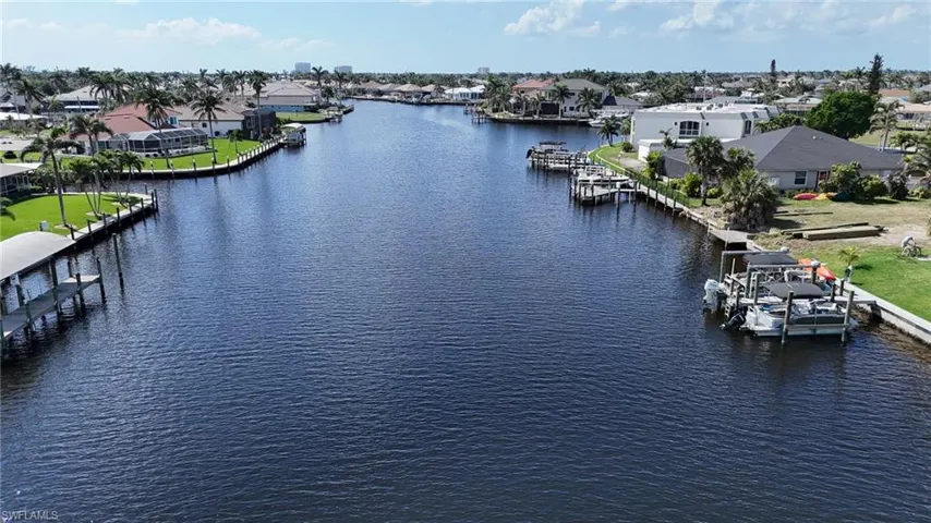 Aerial view with a residential view and a water view