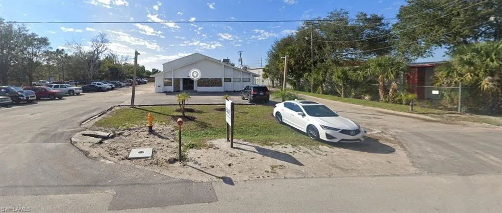 View of front of home featuring uncovered parking