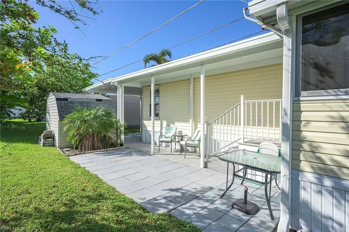 View of patio / terrace with a storage shed