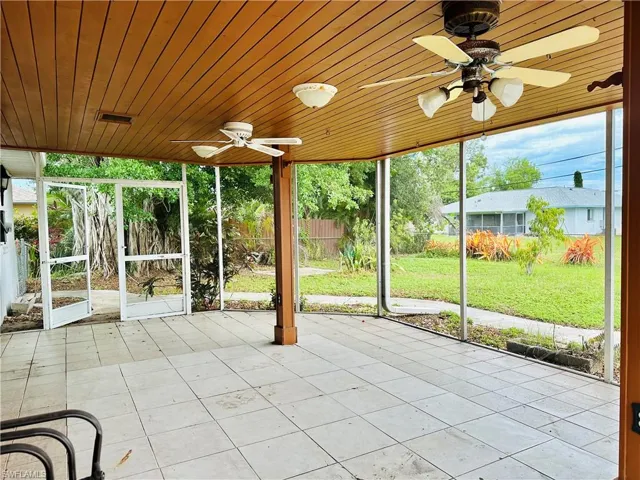 View of patio featuring ceiling fan