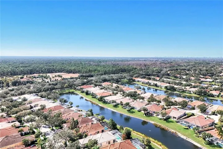 Aerial view of residential area with a large body of water