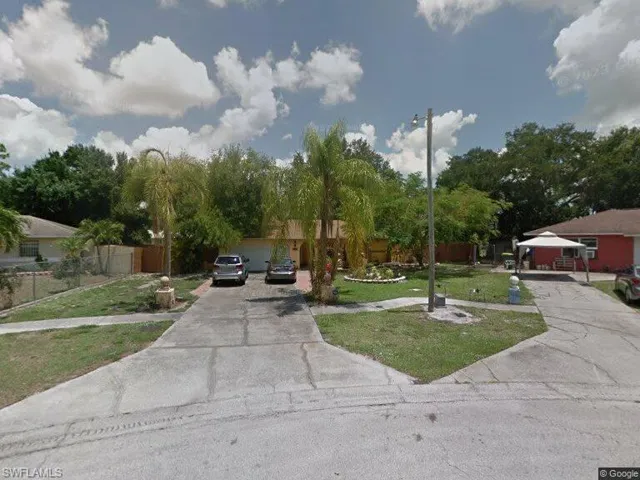 View of front of property with a front yard