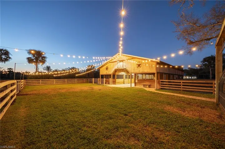 View of yard at dusk