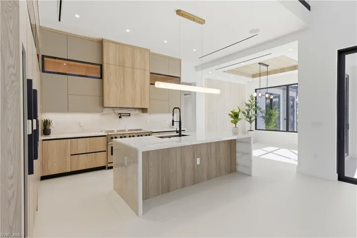 Enchanting gourmet kitchen showcasing sleek, modern design and premium craftsmanship!