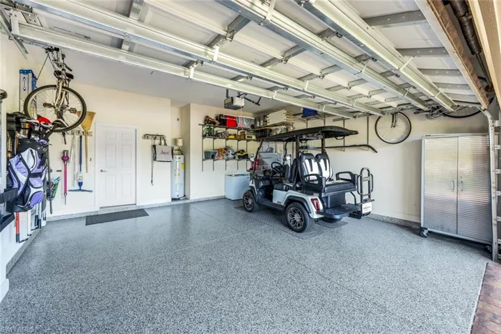 Garage envy!  Epoxy floor and built in shelving.