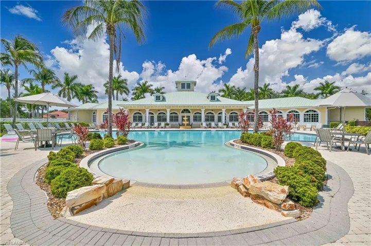 Community pool with a patio area
