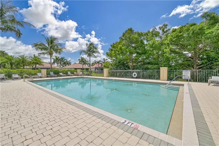 Community pool #2 featuring a patio