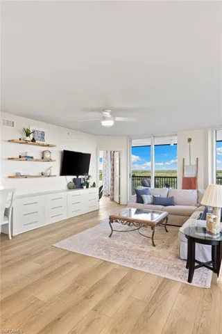 Living room with light wood-type flooring