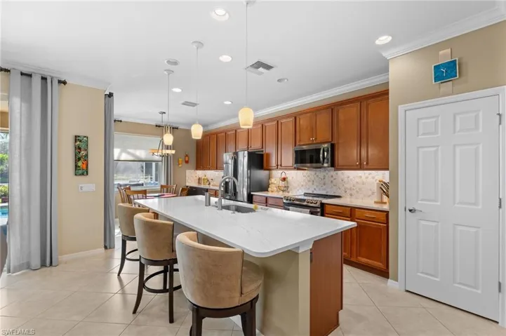 Open kitchen with counter seating.