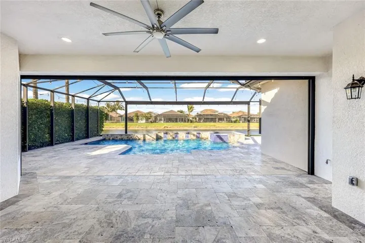 View of swimming pool with a water view