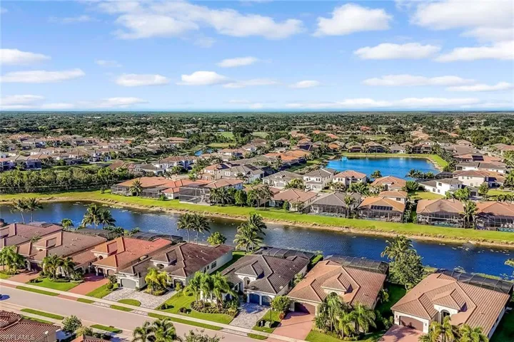 Aerial view of residential area with a large body of water