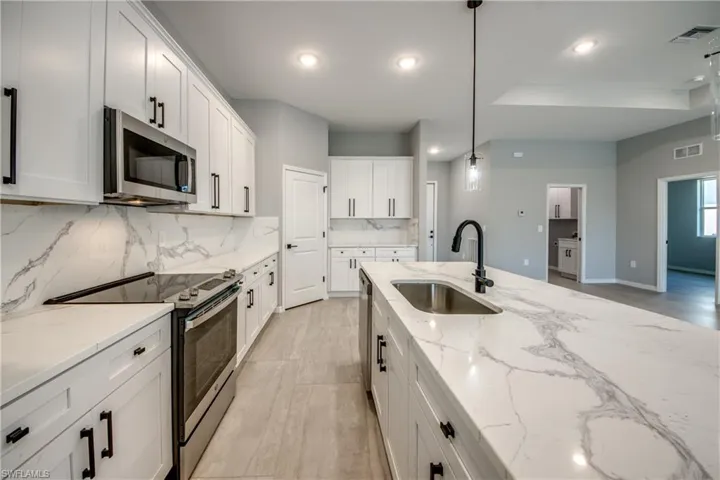 219 SE 15th AVE, CAPE CORAL FL 33990