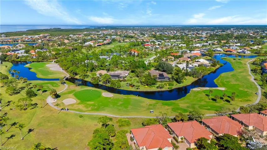 Bird's eye view featuring view of golf course, a residential view, and a water view