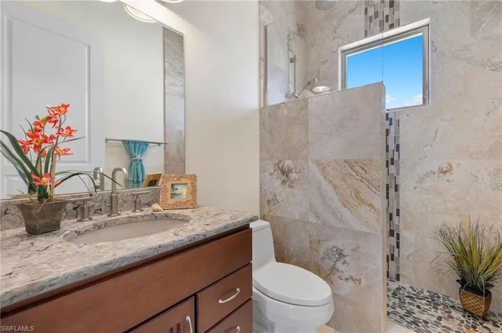 This shower area adjoins the guest bedroom as well as the office/den.