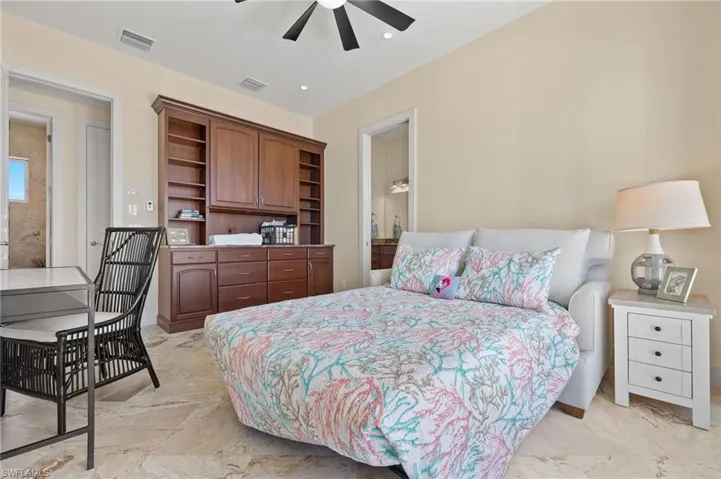 The Office/Den can also be set up as an optional 3rd sleeping area. This room also features built in cabinetsand bookcase and a see-thru fireplace.