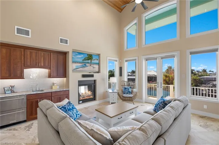Living room with wet bar and gas fireplace