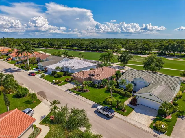 Aerial view of residential area with a golf club