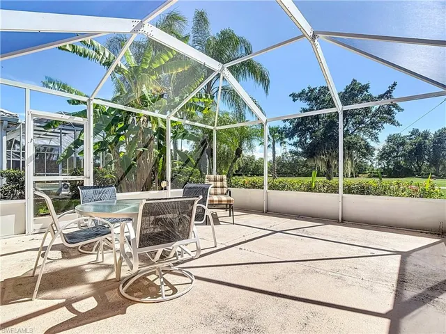 Screened Lanai with outdoor dining space, a patio, and plenty of natural light
