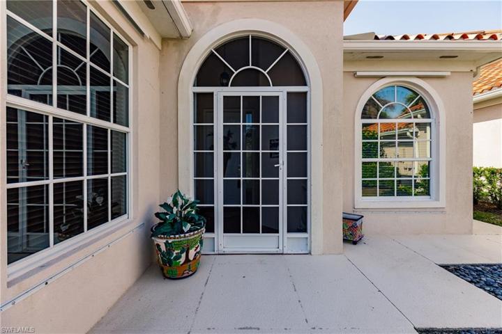 Screened front entry.  Full hurricane protection.