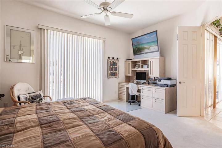 Master bedroom has sliders to the pool area and lets in very nice natural light.
