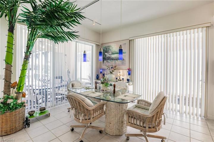 Dining area has lake and pool views.