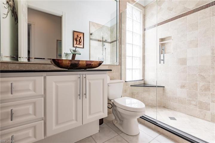 Guest bathroom has been remodeled with a new shower.