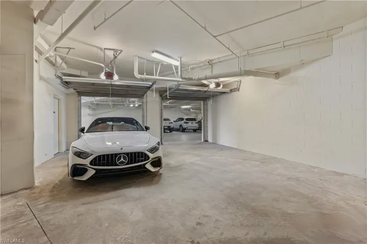 enclosed private 2 car gagre with additional a/c storage