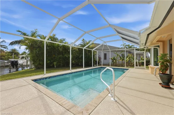 Heated Saltwater Pool with screen enclosure.