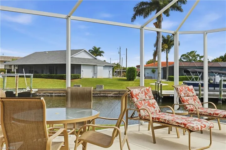 Sunning area,featuring a canal view