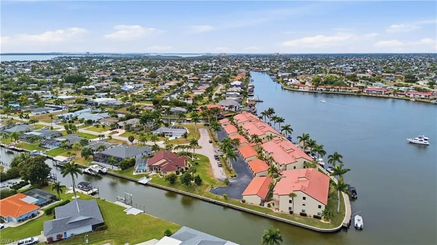 Aerial view of residential area with house on a cul-de-sac, dead end street.