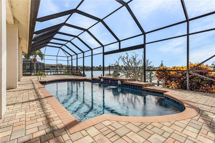 Swimming pool with pavers.
