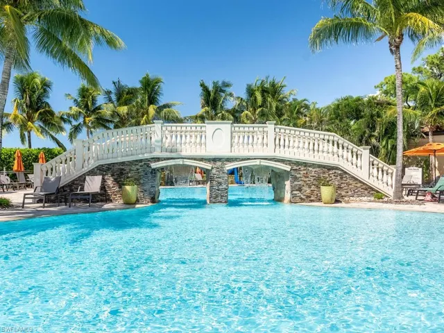 View of swimming pool with pool water feature