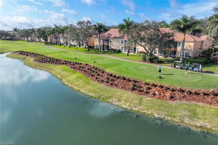 Aerial view of a nearby body of water and a golf course