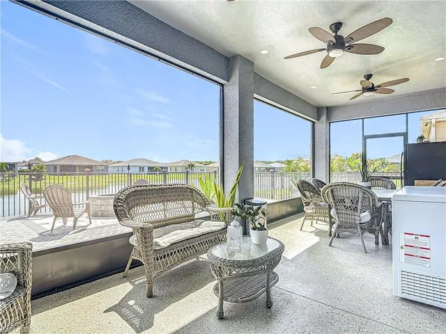 Sunroom / solarium with a residential view