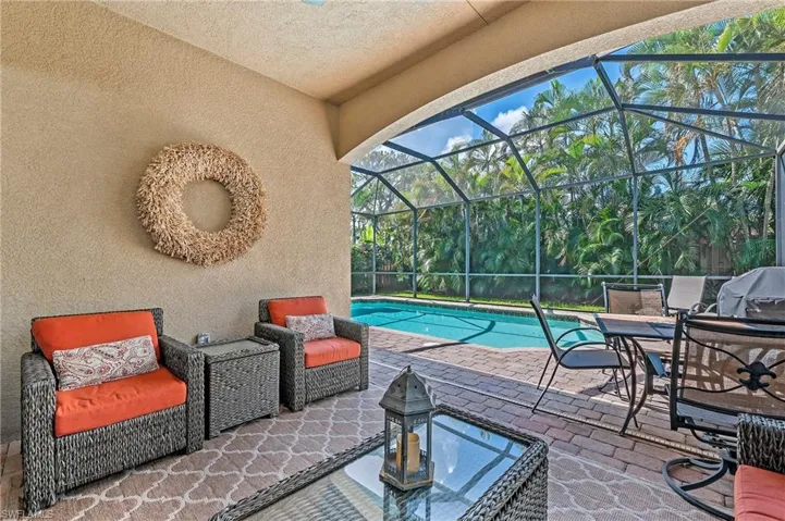 View of pool featuring a lanai and a patio