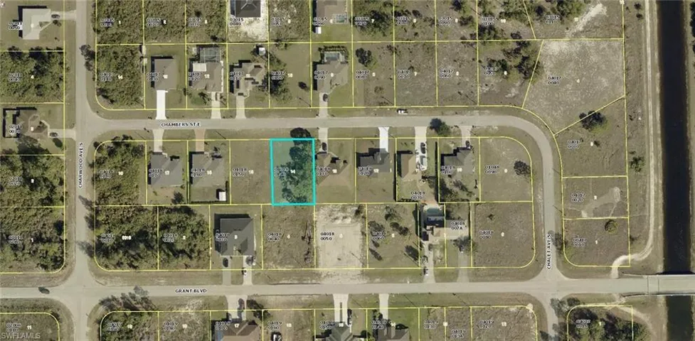 Aerial map of property and surrounding area featuring property parcel outlined