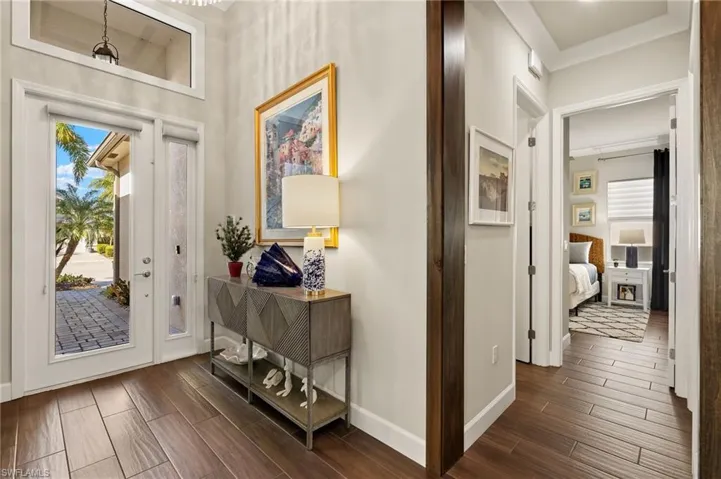 You must see 2 gorgeous chandeliers in this foyer which allows you to see straight through to the lake upon entry!