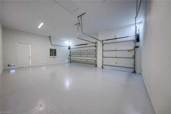 Garage featuring electric panel