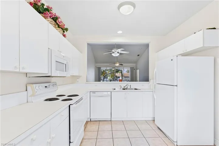 Bright and functional kitchen serves as the heart of the home.