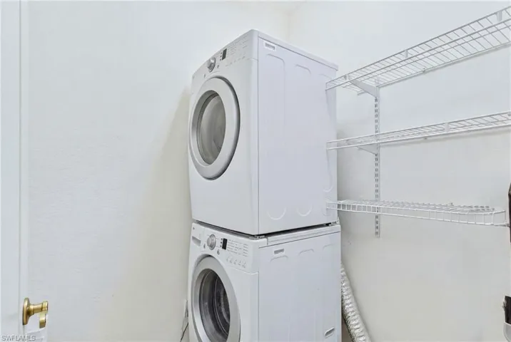 Separate laundry area provides additional storage opportunities.