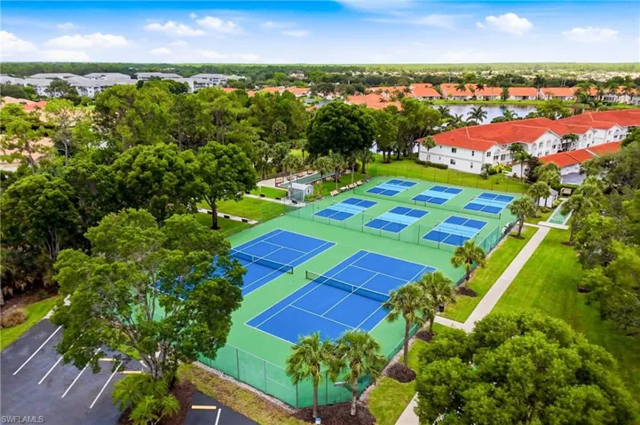 Take in the exceptional lifestyle amenities from above, featuring well-maintained pickleball, tennis, and shuffleboard courts.