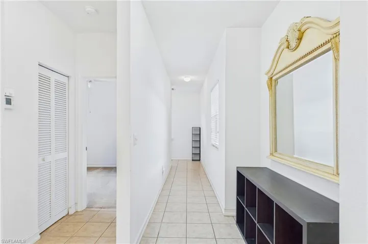 Charming entryway provides a seamless transition into the comfortable and inviting living space.