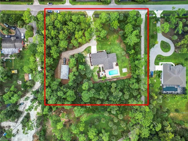 Birds eye view of property. Rarely available 2.5 acre 330ft x 330ft square lot.
