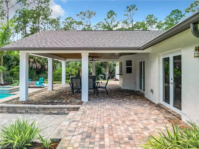 View of covered patio / terrace featuring French doors