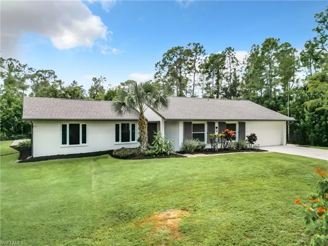 Room to roam with a perfect sized yard surrounded by a naturally wooded privacy buffer.