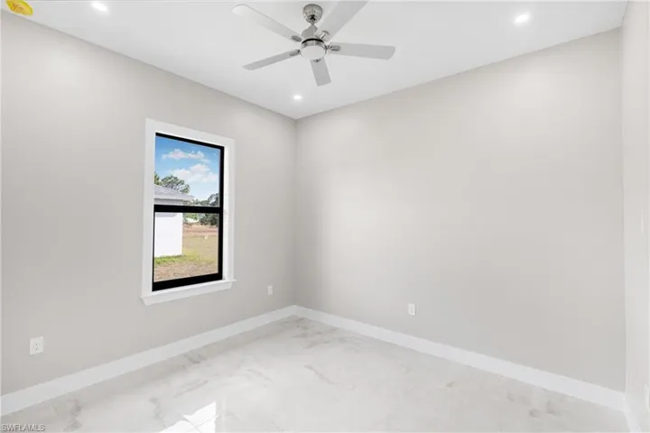 Unfurnished room with ceiling fan