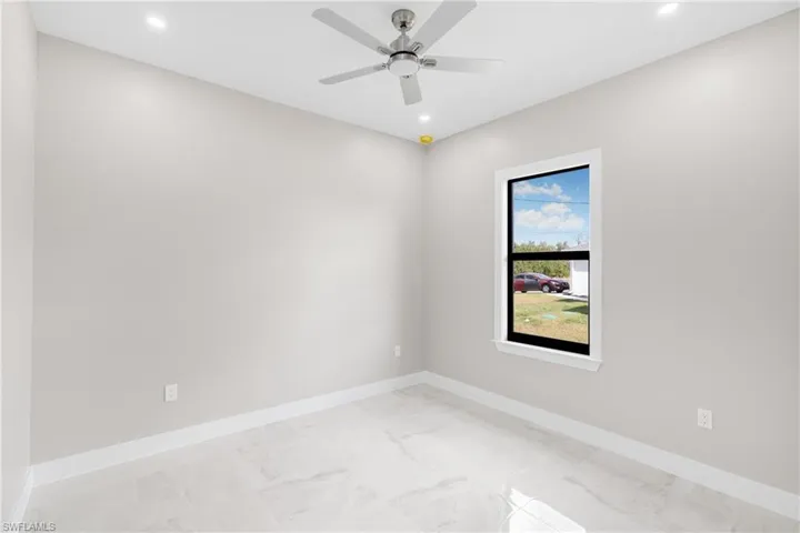 Unfurnished room with ceiling fan