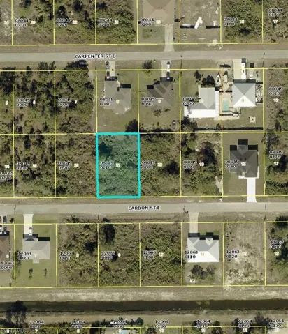 Aerial map of property and surrounding area with property boundaries highlighted