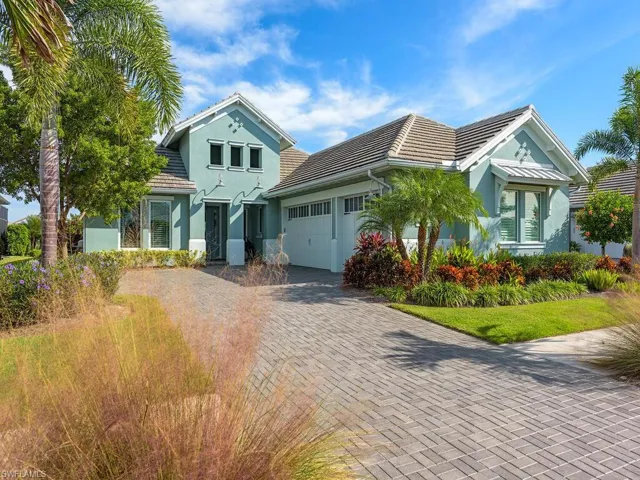 Welcome to 6197 Megans Bay Drive in The Isles of Collier Preserve.